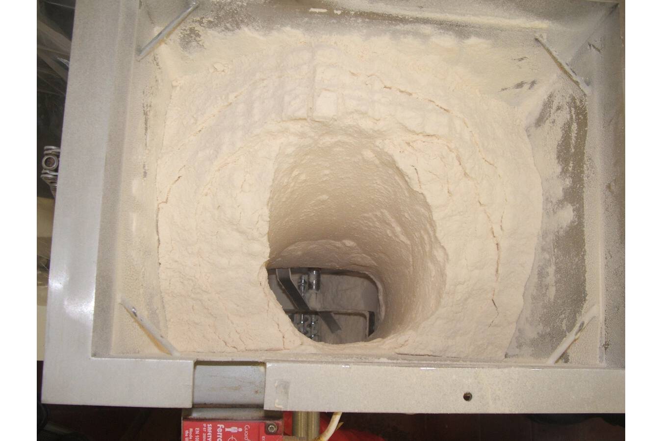 Why do your powders get stuck in a hopper?